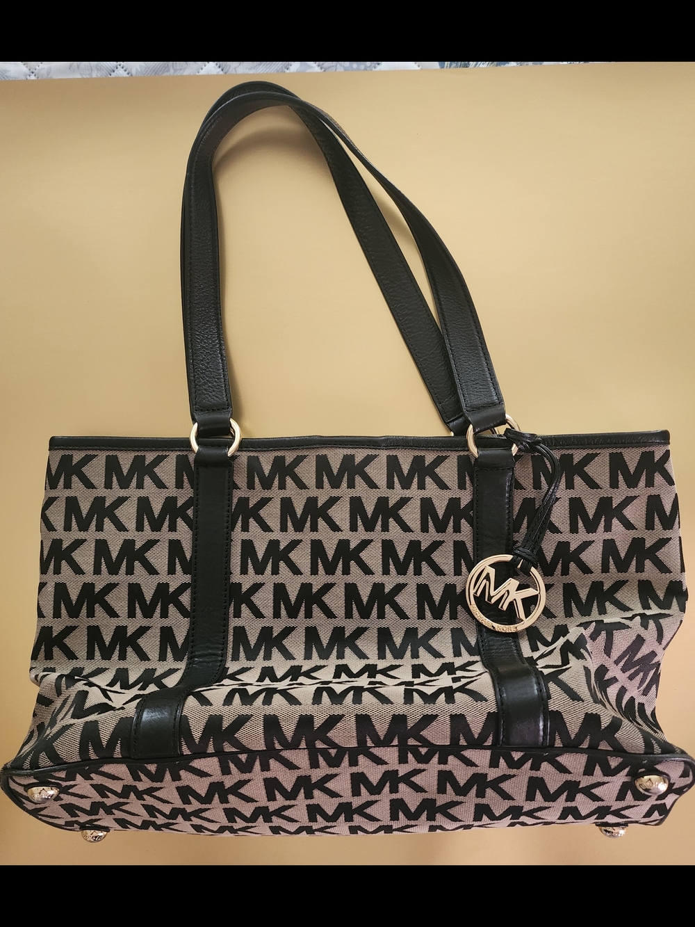 Michael Kors Black and Beige MK Logo Tote with Gold Charm